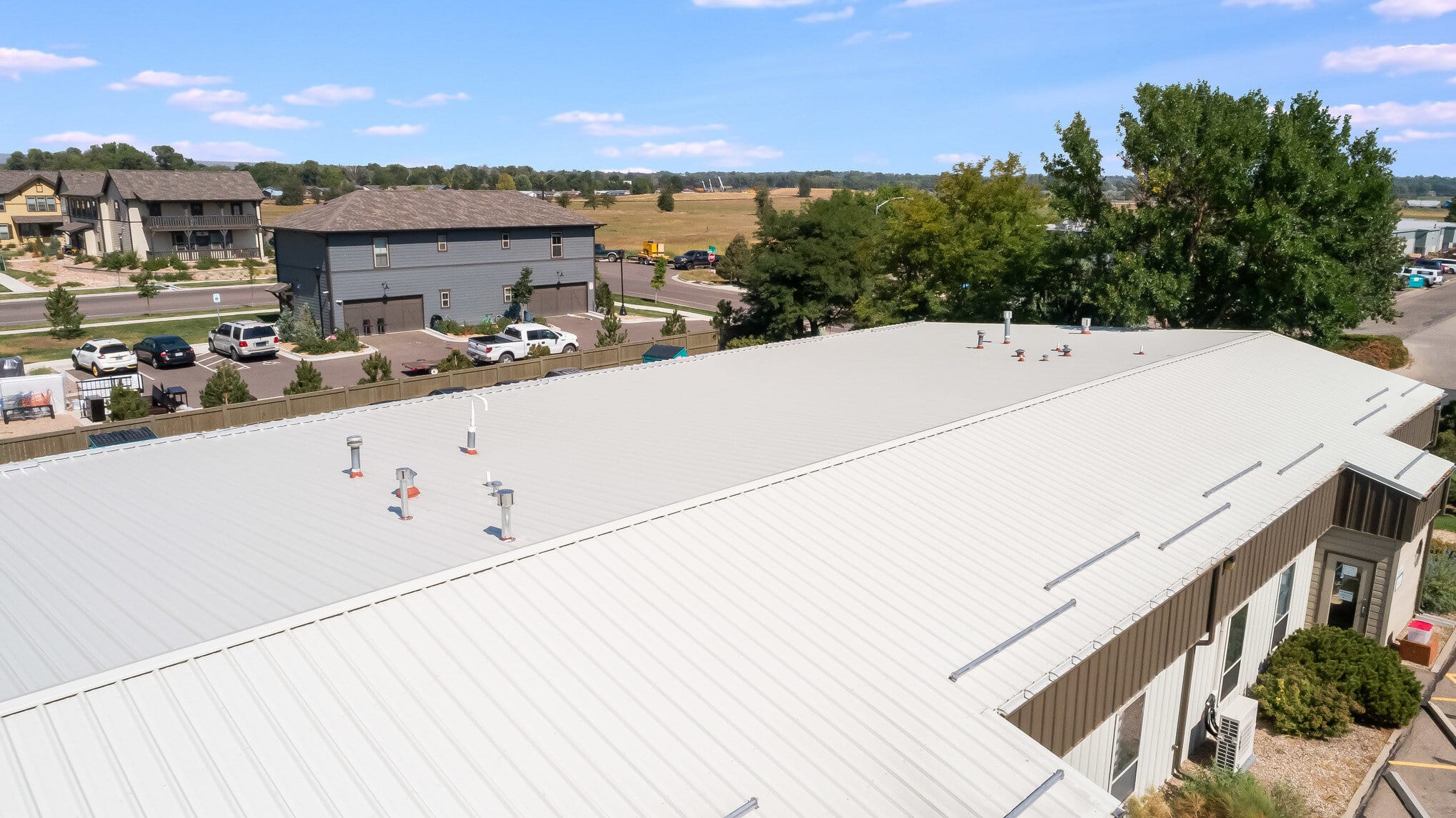 Top view of a metal roof on a large commercial building