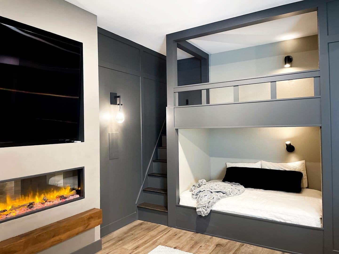 Kid's bedroom with built-in bunk beds and glassed-in fireplace