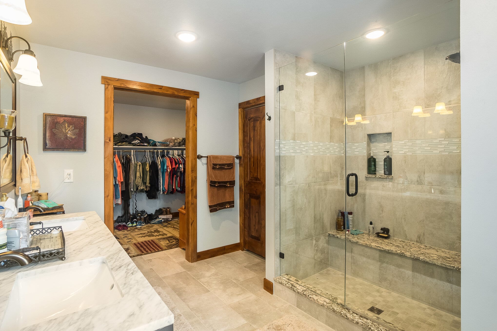 Large bathroom with shower and walk-in closet