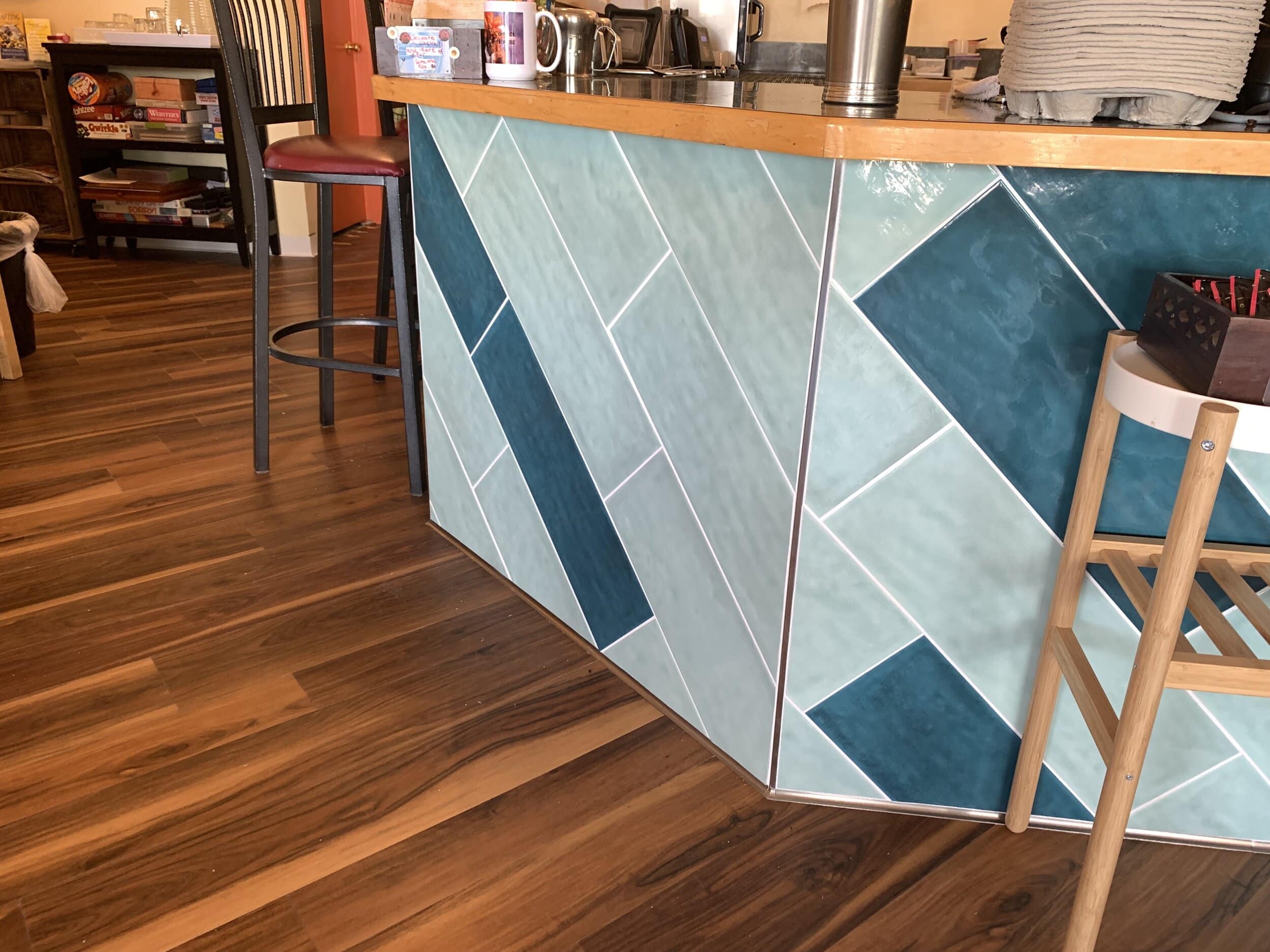 Coffee bar with blue tile and a wood countertop