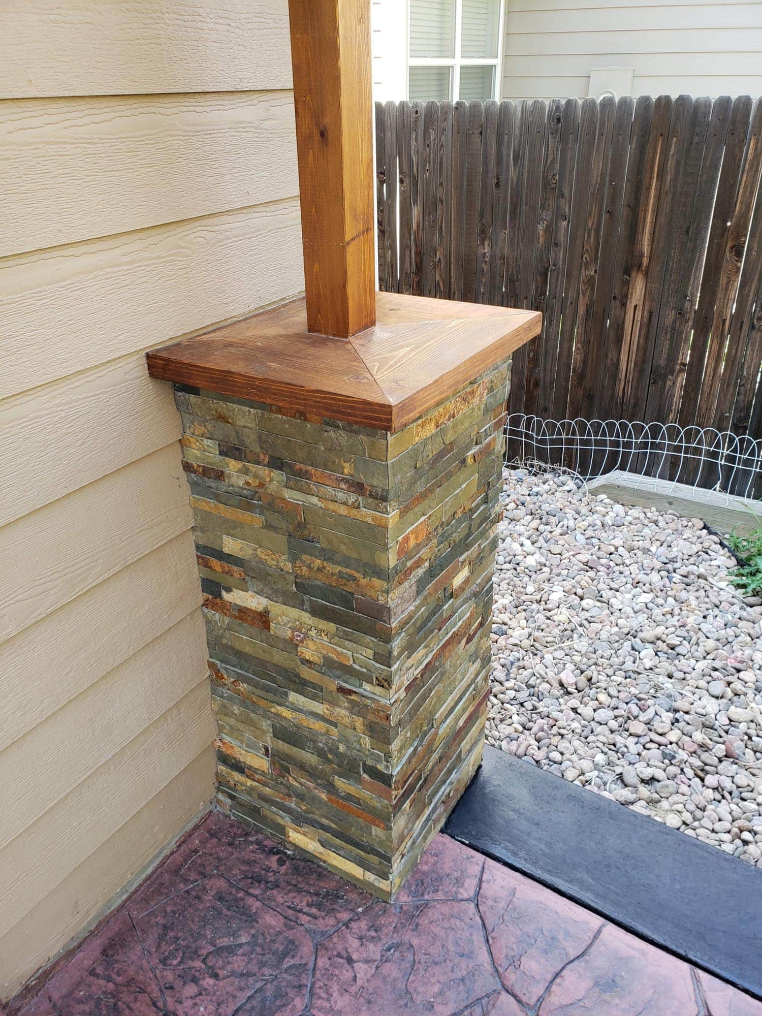 Wood and stone outdoor support pillar on a home
